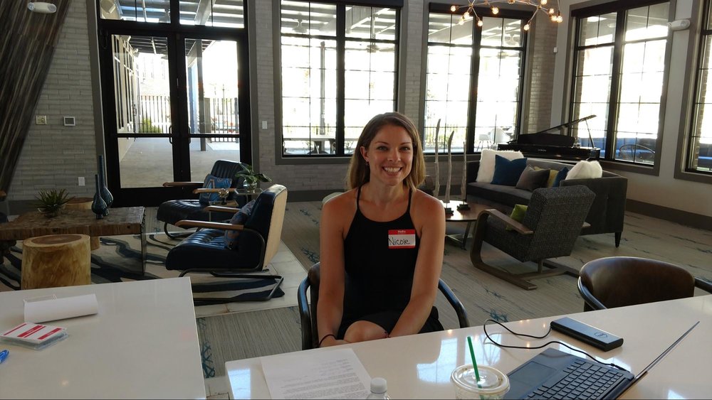 Nicole getting folks setup at an apartment SimulSearch in Gilbert, AZ.