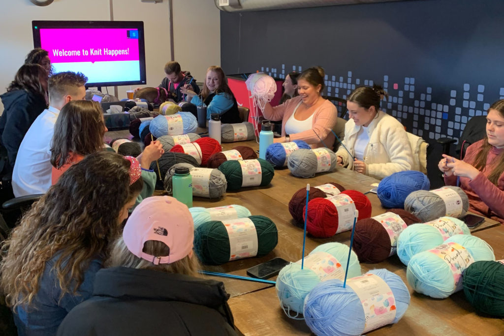 Digible employees knitting